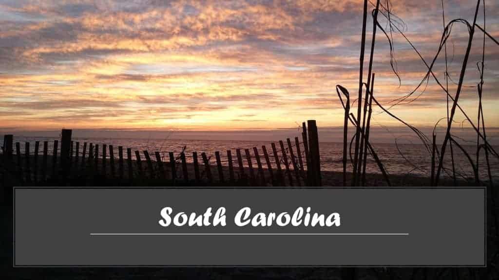 Scenic South Carolina beach sunset with golden sands and gentle waves, ideal for a peaceful vacation.